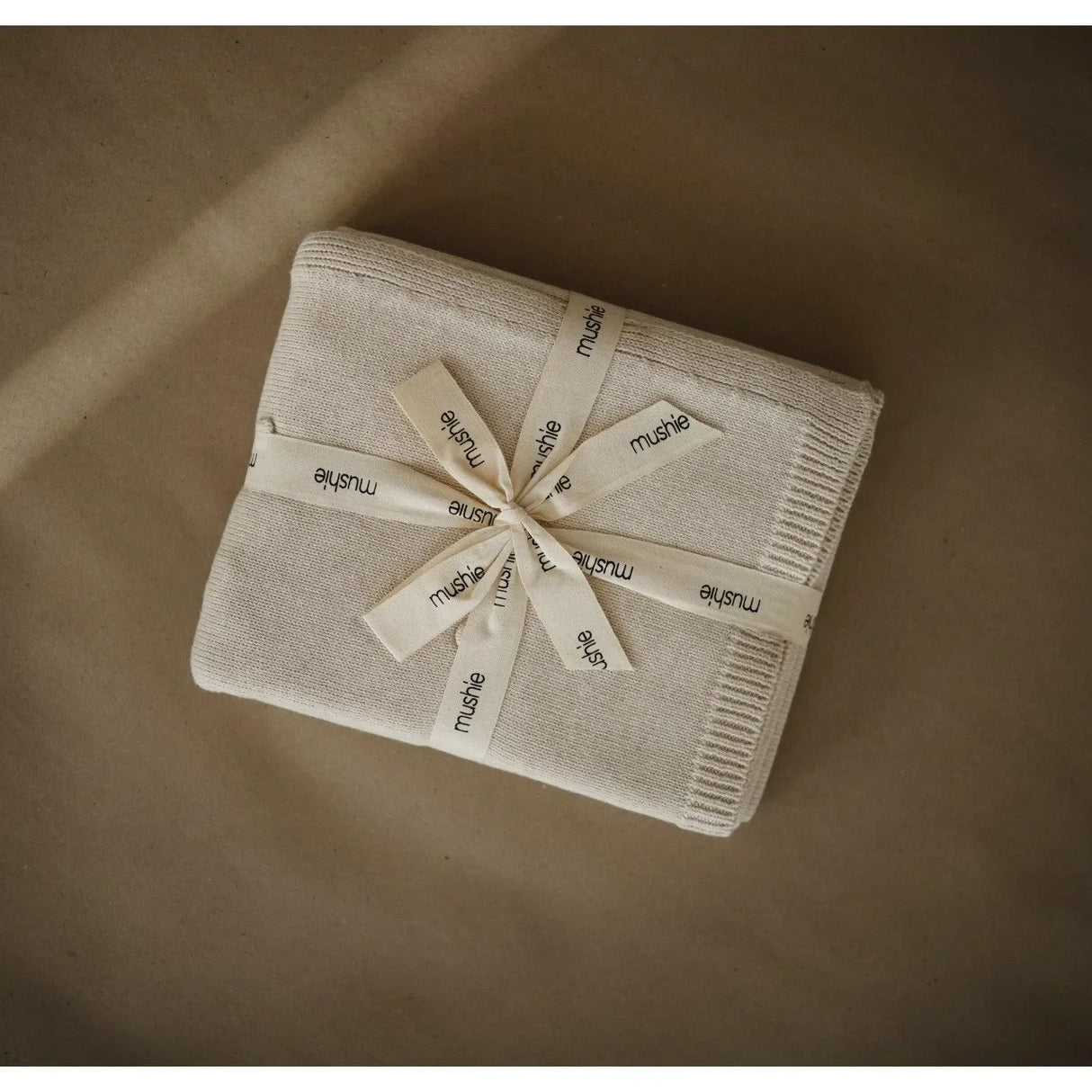 MUSHIE Babydecke aus Bio-Baumwolle Gestrickt - Textured Dots "Blush"