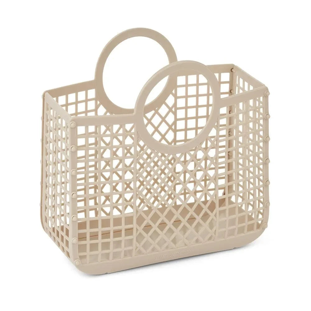 Beige Kinderkorb aus Kunststoff mit runden Griffen und Gittermuster, ideal zur Aufbewahrung