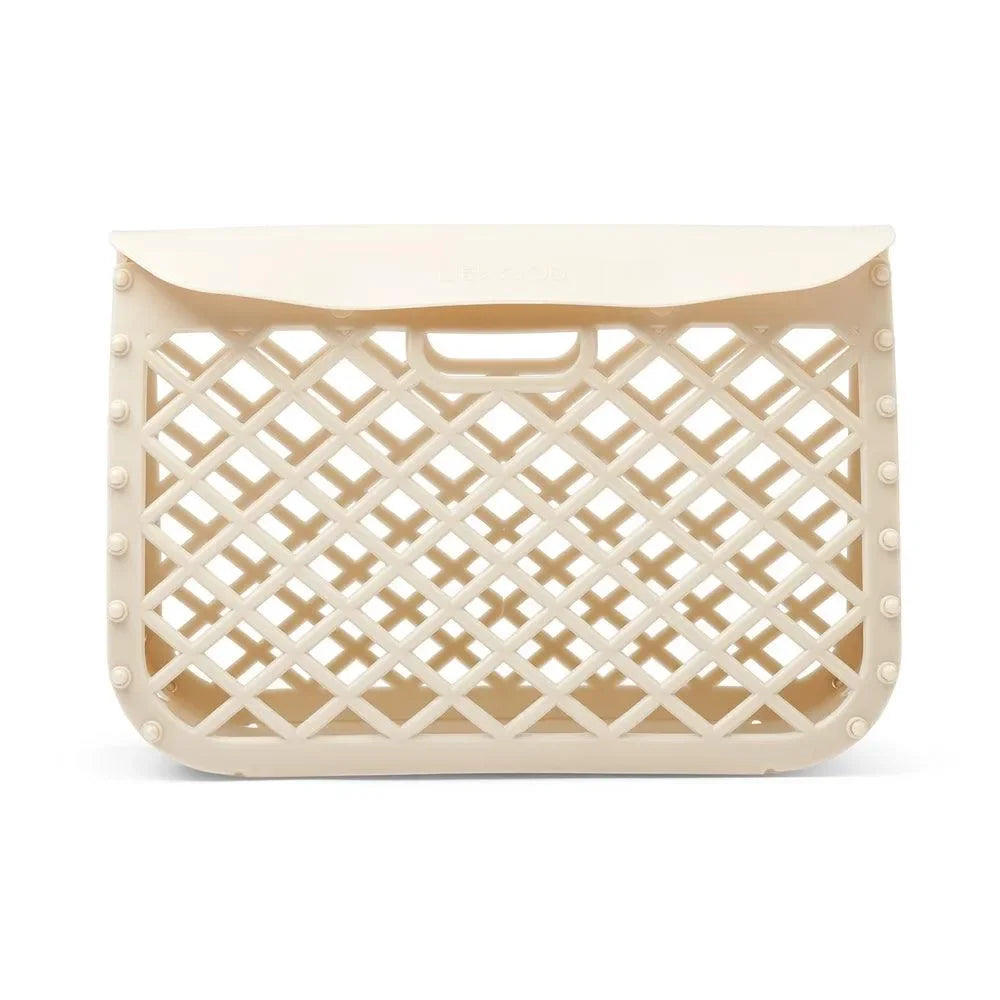 Beige Kinderstoffkorb aus Kunststoff mit Gittermuster, ideal zur Aufbewahrung im Kinderzimmer.
